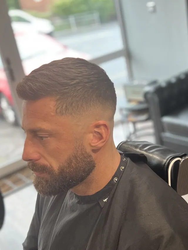 A crop and beard in the chair at Arkham Barbers